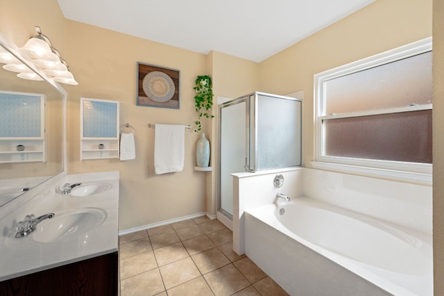 bathroom featuring vanity, tile patterned floors, and separate shower and tub