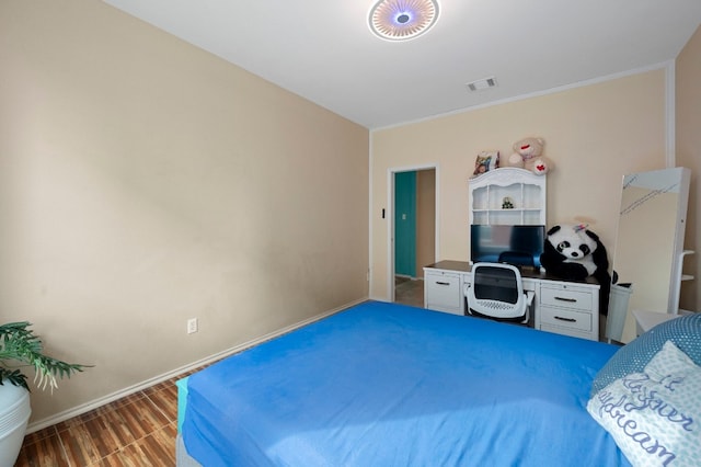 bedroom featuring hardwood / wood-style floors