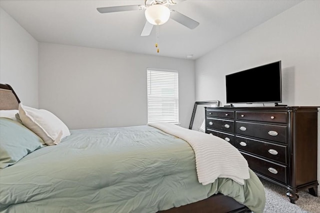 bedroom featuring ceiling fan and light colored carpet