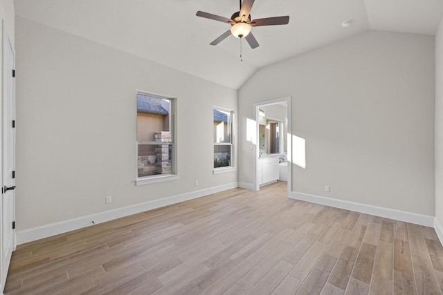 unfurnished room featuring light hardwood / wood-style floors, ceiling fan, and lofted ceiling