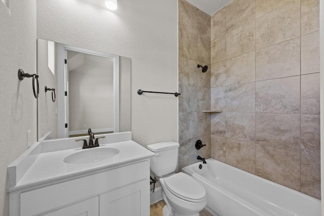 604 Bottlebrush Dr, Georgetown, TX 78628 - bathroom featuring vanity,  shower combination, and a textured wall