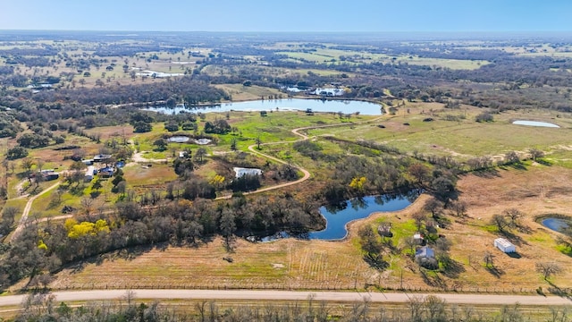 bird's eye view with a rural view and a water view