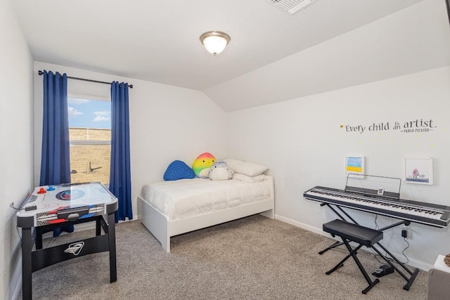 bedroom with baseboards, visible vents, vaulted ceiling, and carpet flooring