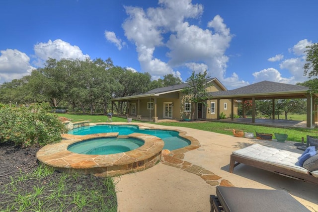 view of swimming pool featuring an in ground hot tub, a gazebo, a patio, and a lawn