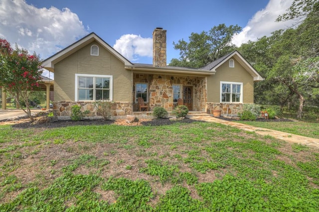 view of front of house with a front lawn