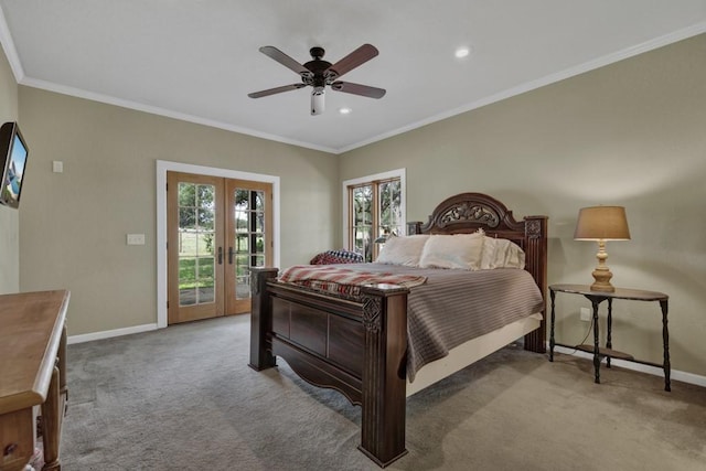 carpeted bedroom with access to exterior, french doors, ceiling fan, and crown molding