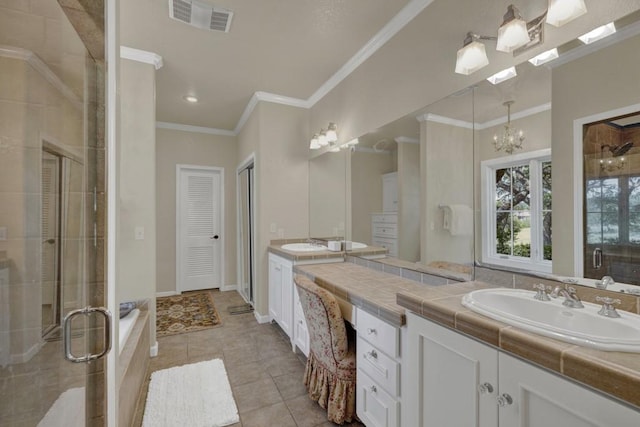 bathroom featuring vanity, crown molding, tile patterned flooring, independent shower and bath, and a chandelier