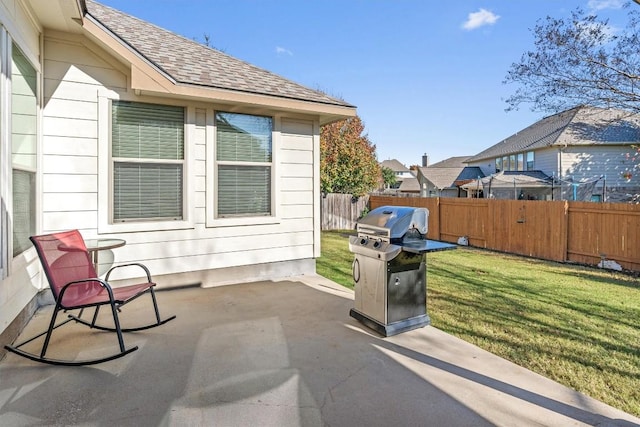 view of patio with a grill