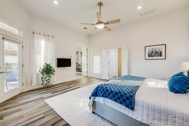 7302 Matisse Pointe Dr, Jonestown, TX 78645 - bedroom featuring light wood-type flooring, access to outside, recessed lighting, a ceiling fan, and baseboards