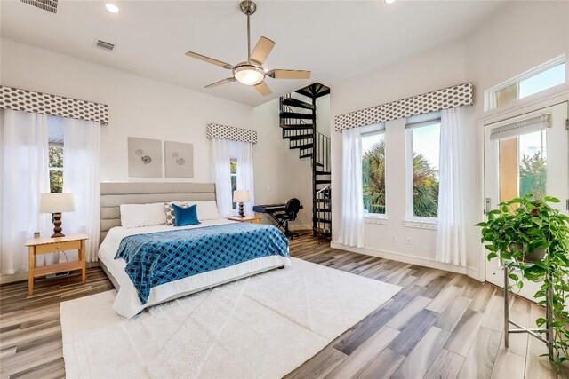 7302 Matisse Pointe Dr, Jonestown, TX 78645 - bedroom featuring wood finished floors, recessed lighting, baseboards, lofted ceiling, and a ceiling fan