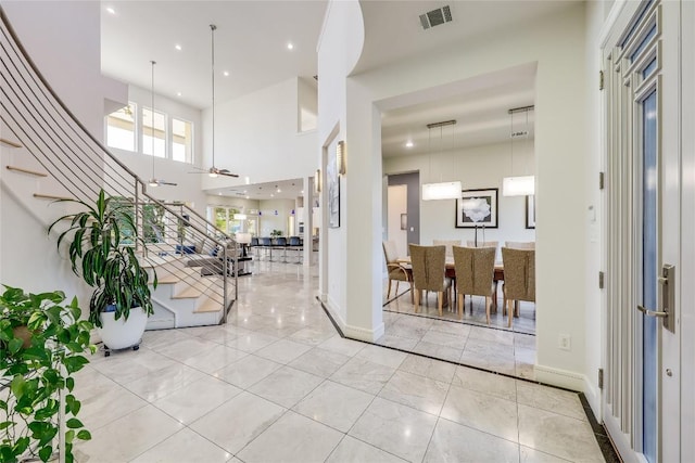 7302 Matisse Pointe Dr, Jonestown, TX 78645 - entrance foyer with stairway, baseboards, recessed lighting, a towering ceiling, and a ceiling fan