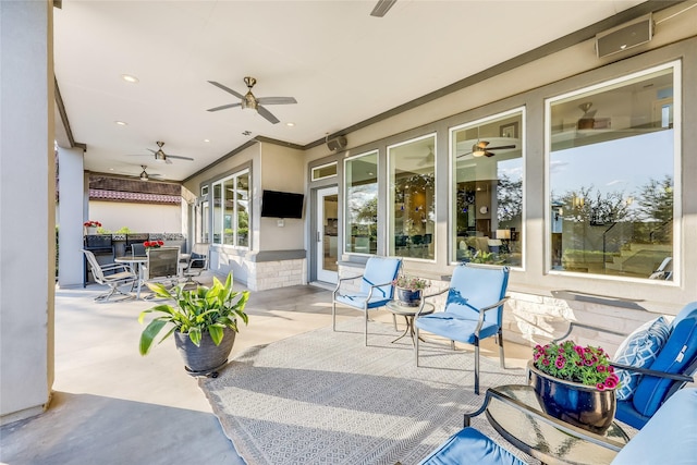 view of patio / terrace with ceiling fan