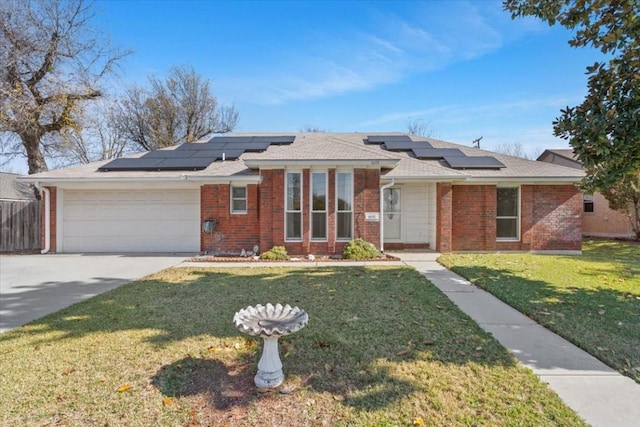 single story home with a front yard and a garage