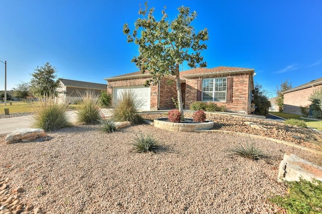 ranch-style home with a garage