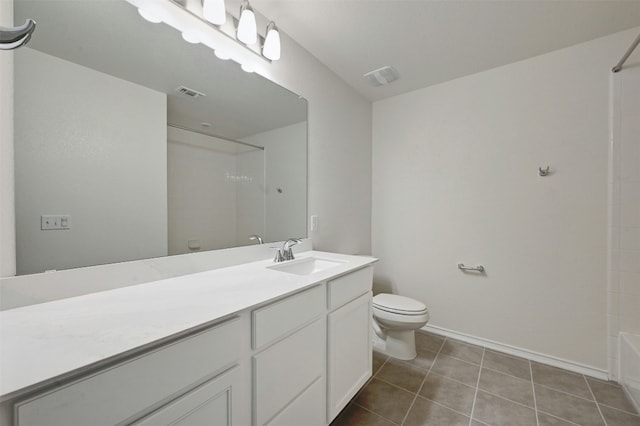 full bathroom featuring tile patterned flooring, vanity, toilet, and washtub / shower combination