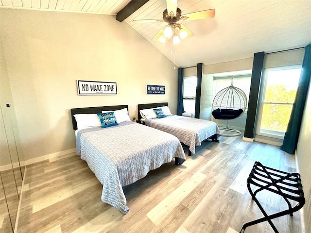 bedroom with ceiling fan, hardwood / wood-style floors, lofted ceiling with beams, and wooden ceiling