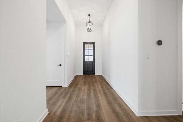 208 San Xavier St, Georgetown, TX 78633 - foyer entrance with wood finished floors and baseboards