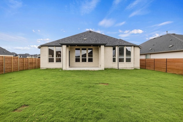 208 San Xavier St, Georgetown, TX 78633 - back of house featuring a fenced backyard, a patio, and roof with shingles