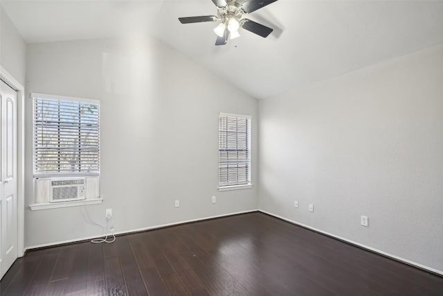 spare room with ceiling fan, cooling unit, wood-type flooring, and lofted ceiling