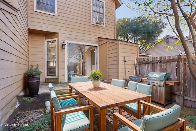 view of patio with a grill