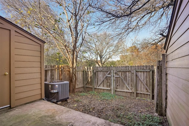 view of yard with central air condition unit