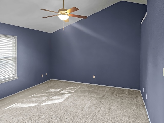 unfurnished room with carpet, ceiling fan, and lofted ceiling