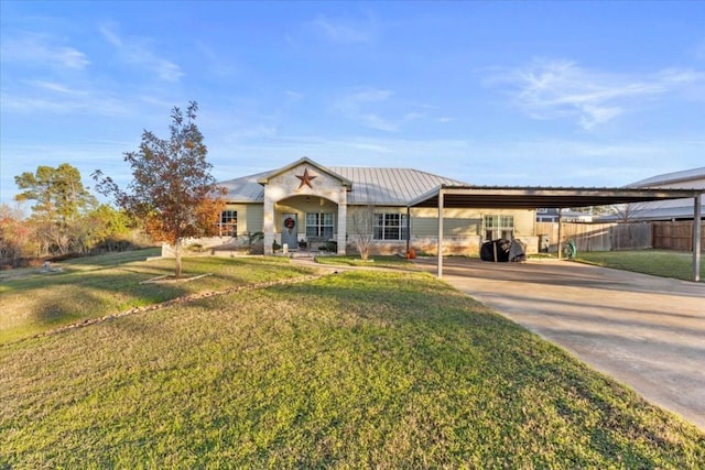 ranch-style house featuring a front lawn and a carport