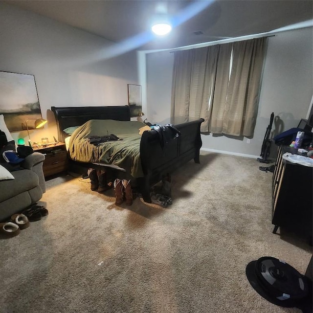 bedroom with light colored carpet