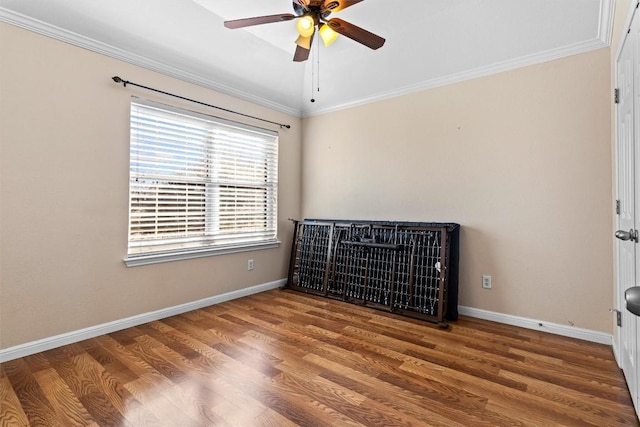 unfurnished bedroom featuring wood-type flooring and crown molding