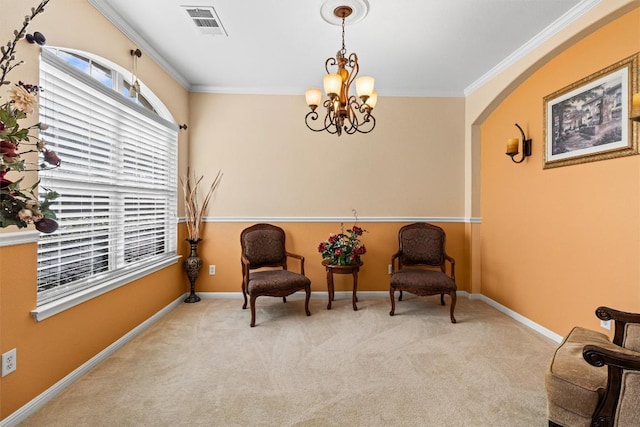 living area featuring light colored carpet, a chandelier, and ornamental molding