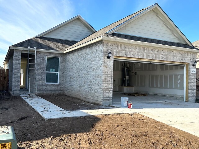 view of front of house featuring water heater