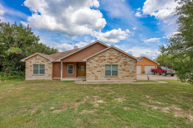 ranch-style home featuring a front lawn, a porch, and a garage