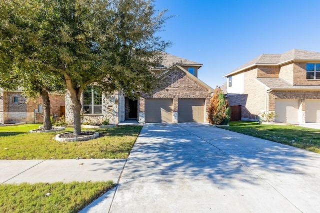 view of front of home with a garage and a front yard