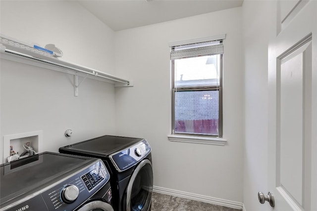 laundry room featuring washing machine and clothes dryer