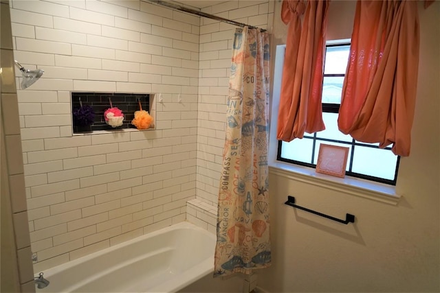 bathroom featuring shower / bath combination with curtain