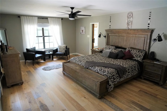 bedroom featuring ceiling fan and light wood-type flooring