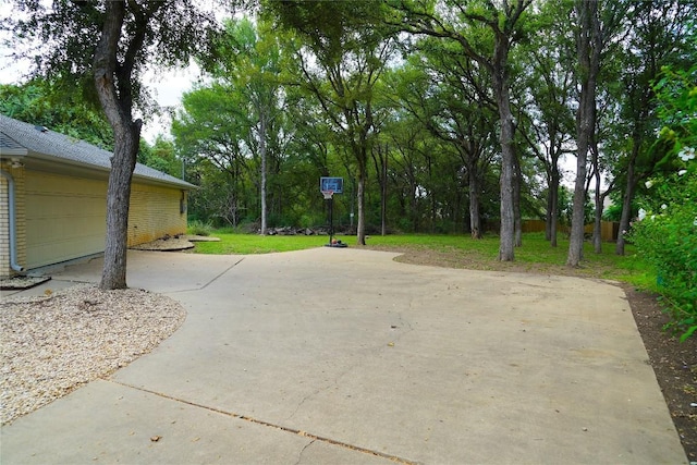 view of patio / terrace featuring a garage