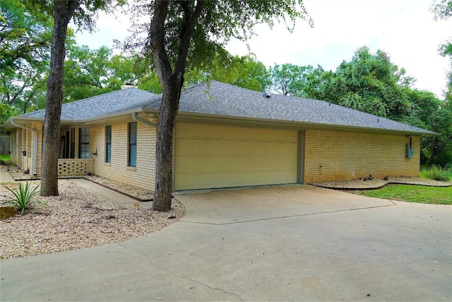 view of side of property featuring a garage