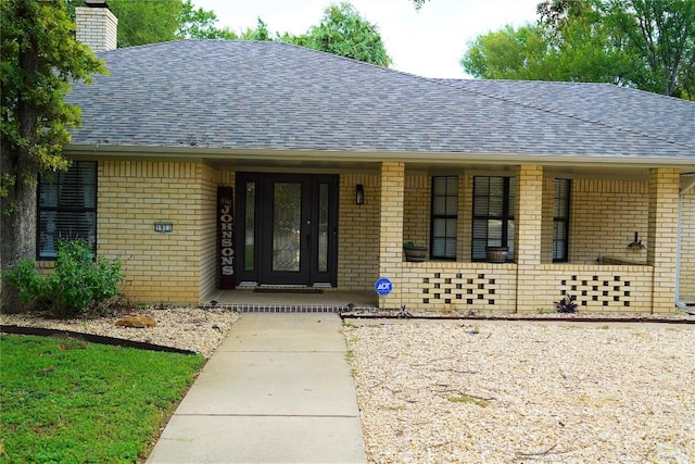 doorway to property featuring a porch