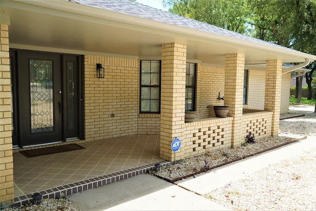 entrance to property with a porch