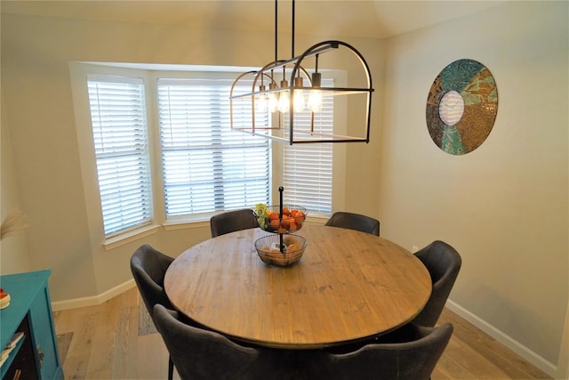 dining space featuring light hardwood / wood-style flooring