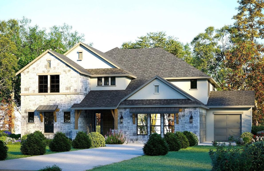 view of front facade featuring a front lawn and a garage