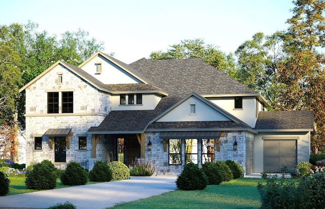 view of front facade featuring a front lawn and a garage