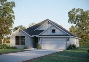 view of front of house featuring a garage and a front lawn