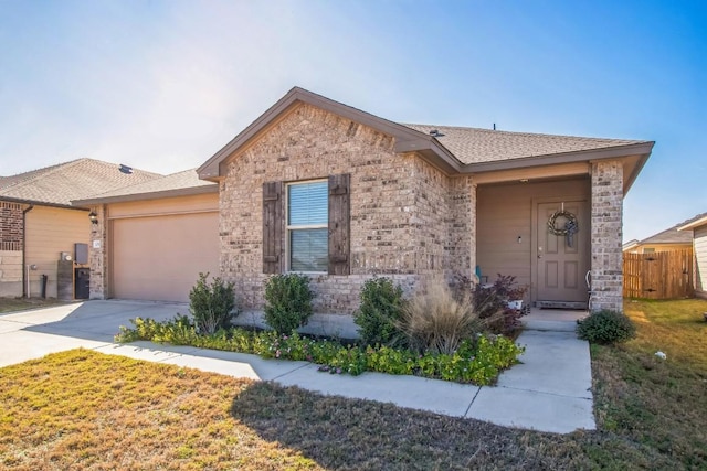 ranch-style home with a garage