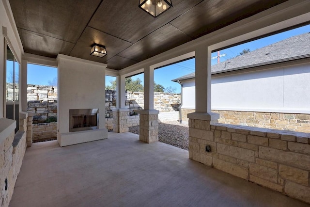 529 Clubhouse Dr, Georgetown, TX 78628 - view of patio featuring exterior fireplace