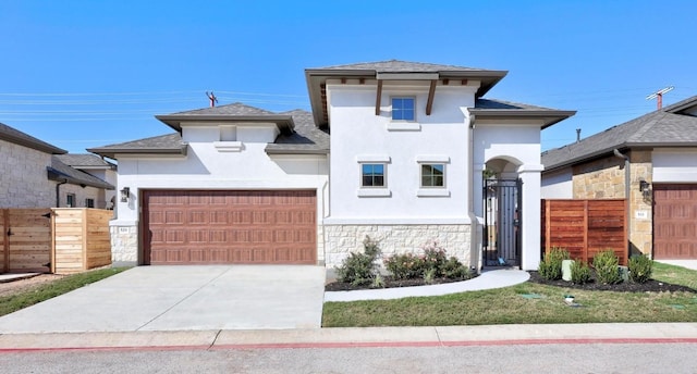 view of front of home with a garage