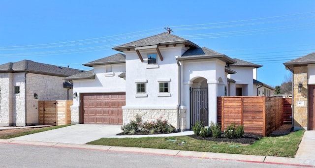 view of front of home with a garage