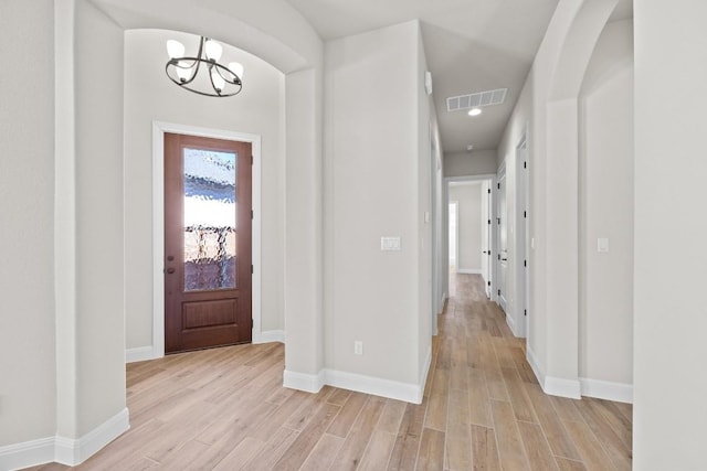 529 Clubhouse Dr, Georgetown, TX 78628 - entrance foyer featuring a chandelier, light wood-style flooring, and recessed lighting