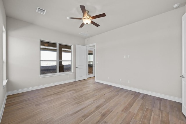 unfurnished room with ceiling fan and light hardwood / wood-style flooring